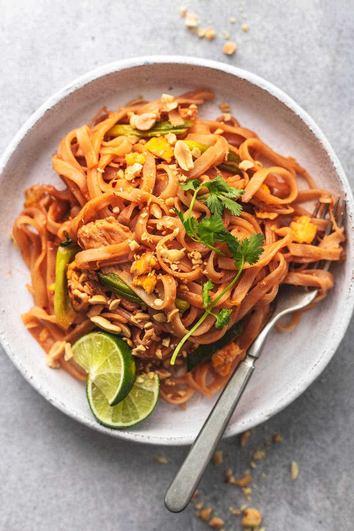 Chicken pad thai in a wok